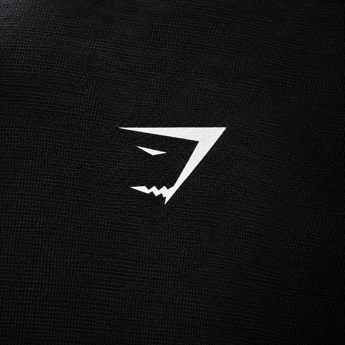 Gymshark Critical Tank Black, detalle de logo y material — Crazy!Duck Hype