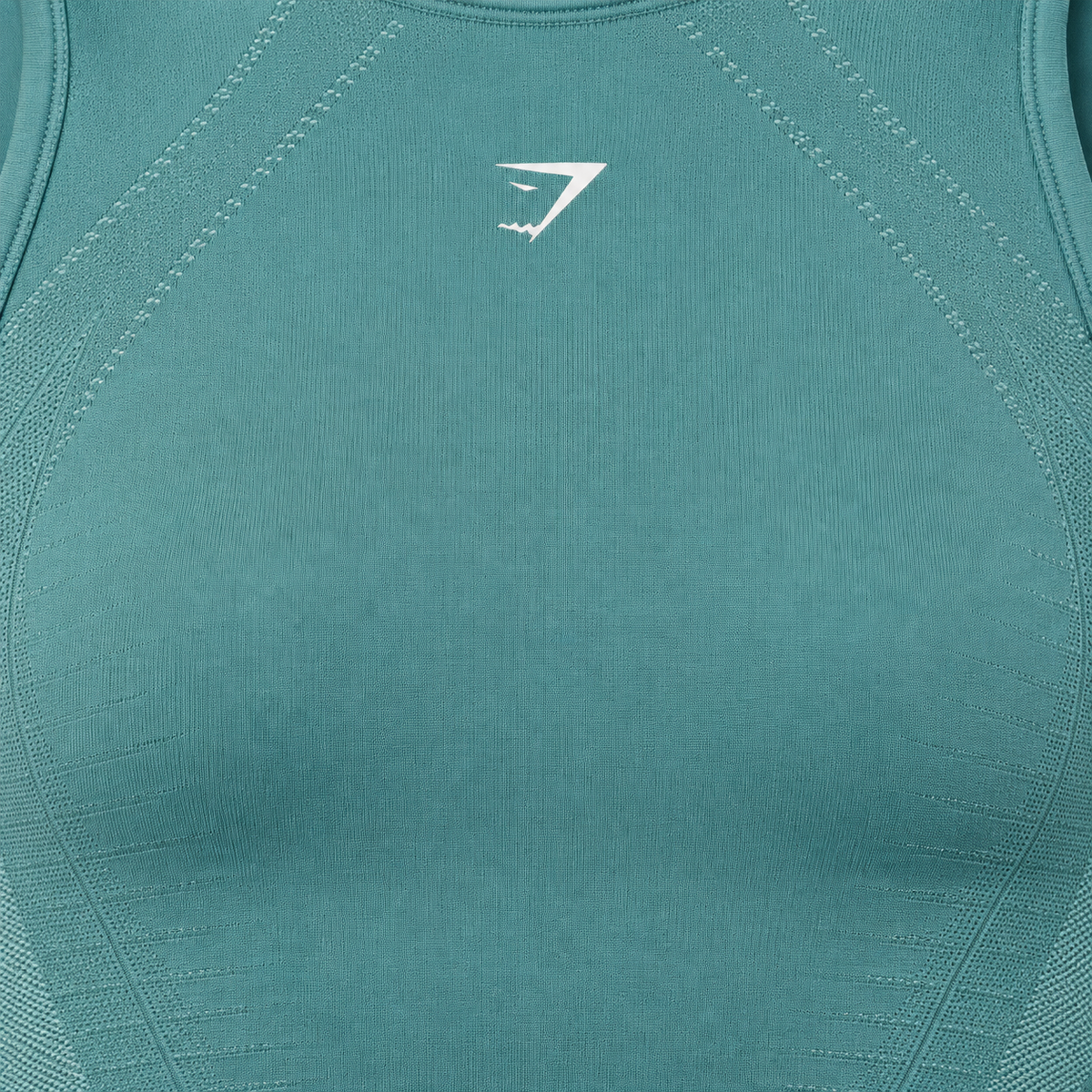 Gymshark Running Seamless Tank Storm Blue/Lifestyle Blue, detalle de logo y material — Crazy!Duck Hype