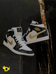 Jordan 1 Mid "Patent Black White Gold"