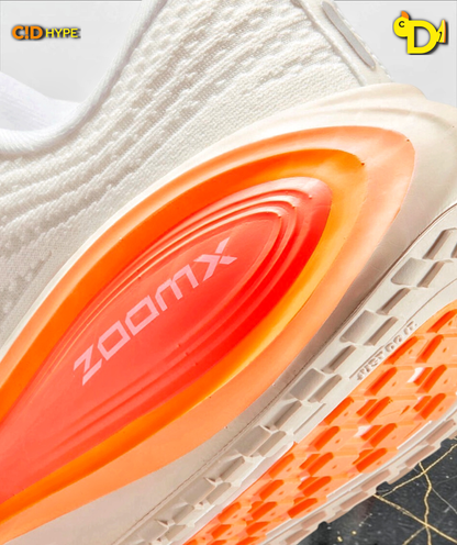 Nike Vomero Plus "Sail Hot Lava Orange"