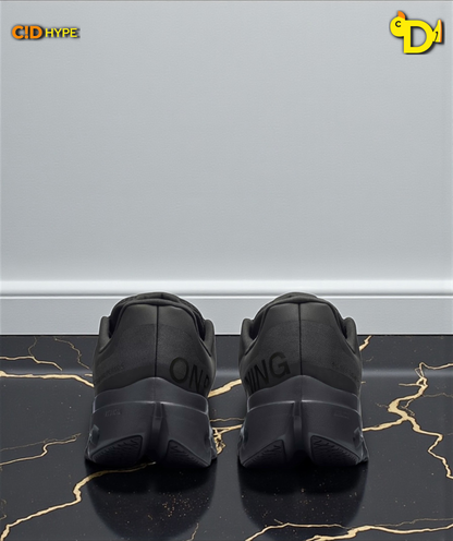 On Cloudsurfer Next "Black/Black/Gray"