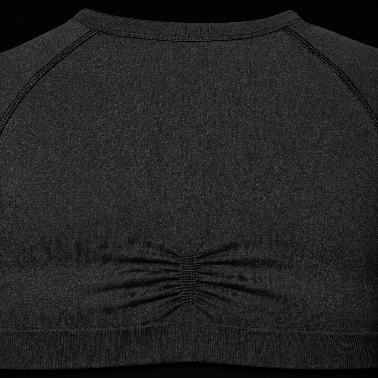 Gymshark Adapt Fleck Seamless Long Sleeve Crop Top Mineral Black, detalle de espalda y confección — Crazy!Duck Hype