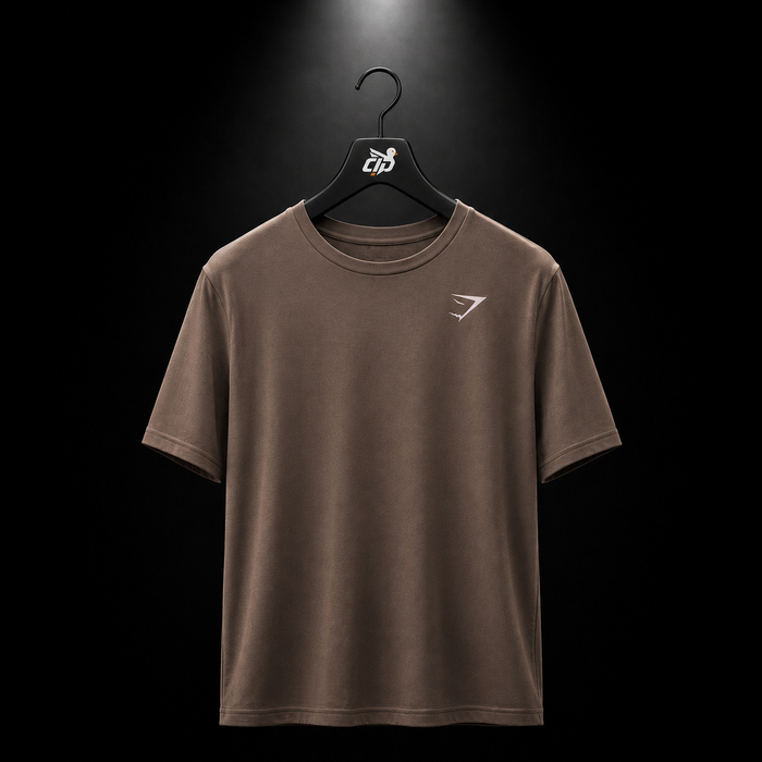 Gymshark Crest T-Shirt Soft Brown, vista frontal — Crazy!Duck Hype