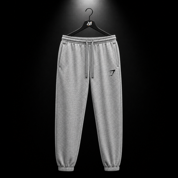 Gymshark Essential Oversized Joggers Charcoal Grey Marl, vista frontal — Crazy!Duck Hype