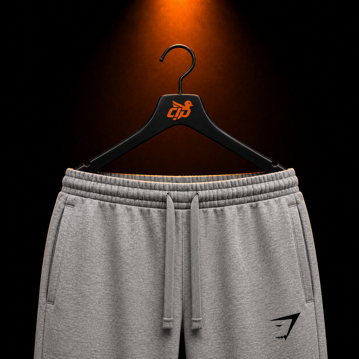Gymshark Essential Oversized Joggers Charcoal Grey Marl con presentación de producto — Crazy!Duck Hype