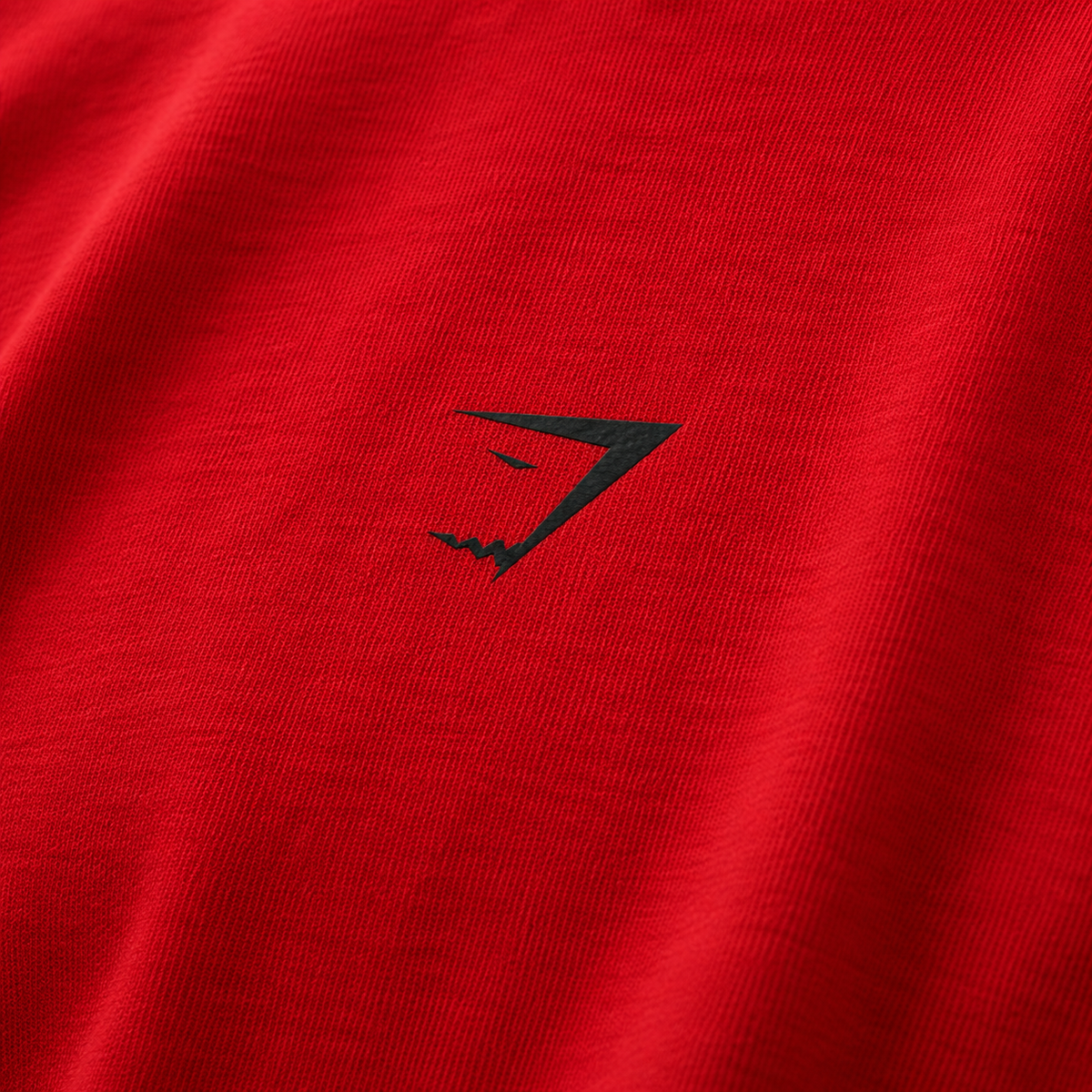 Gymshark Power T-Shirt Conditioning Red, detalle de logo y material — Crazy!Duck Hype