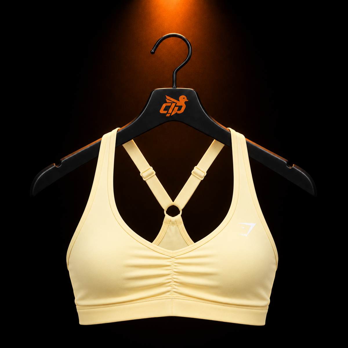 Gymshark Ruched Sports Bra Butter Yellow con presentación de producto — Crazy!Duck Hype