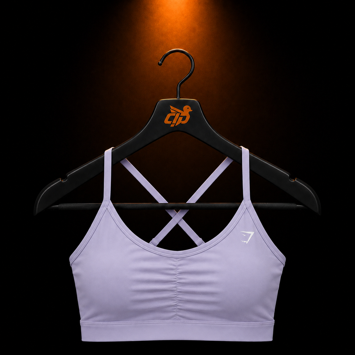 Gymshark Ruched Sports Bra Warm Lilac con presentación de producto — Crazy!Duck Hype