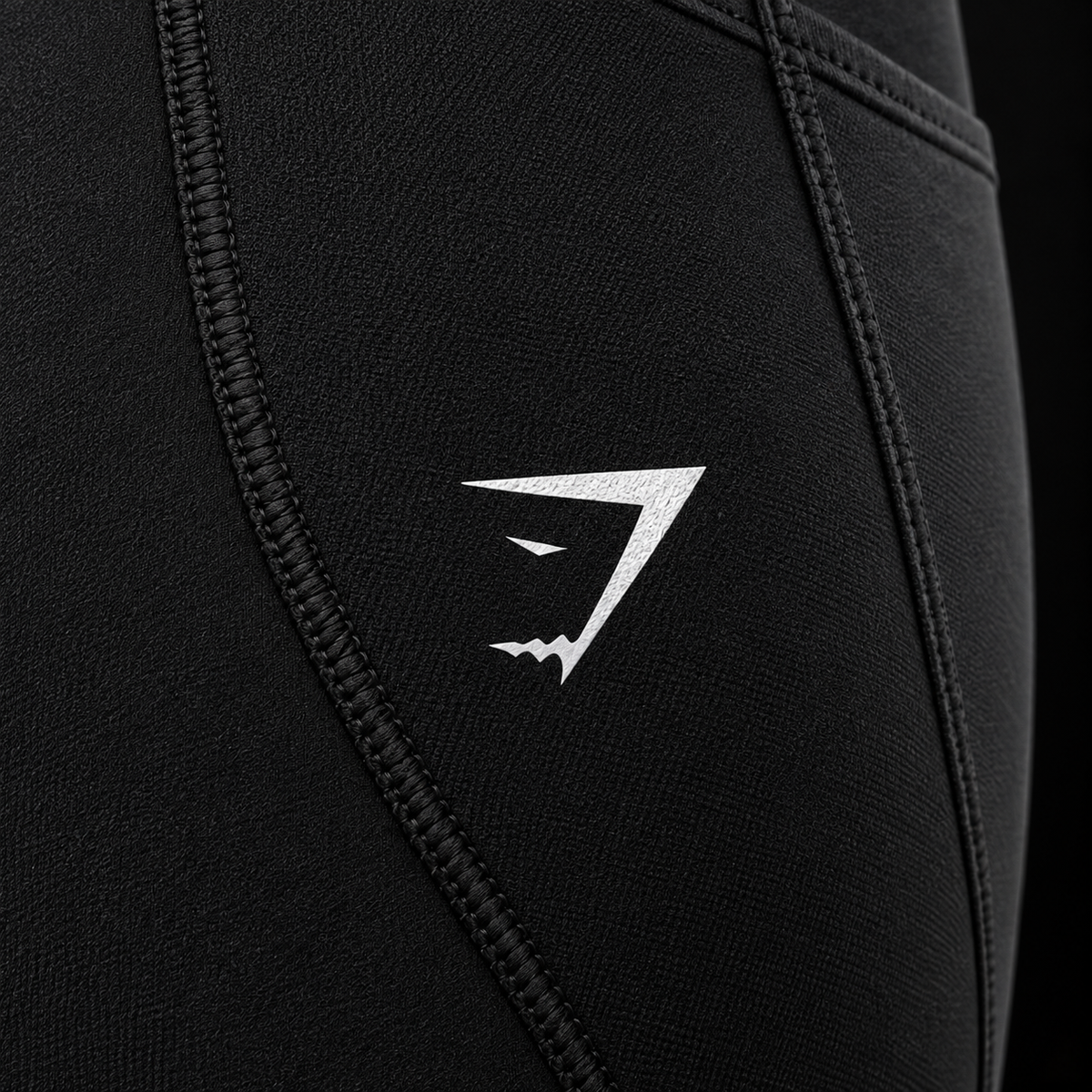Gymshark Running Pocket Leggings Black, detalle de logo y material — Crazy!Duck Hype