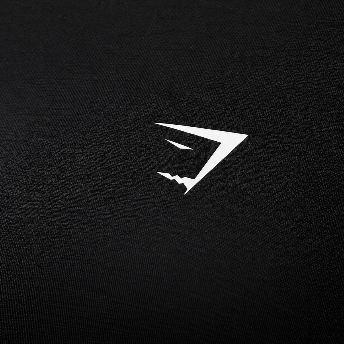 Gymshark Training Shelf Cami Tank Black, detalle de logo y material — Crazy!Duck Hype