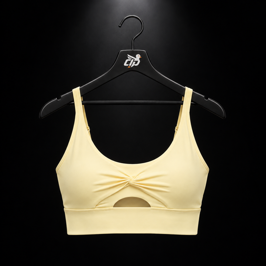 Gymshark Twist Front Sports Bra Butter Yellow, vista frontal — Crazy!Duck Hype