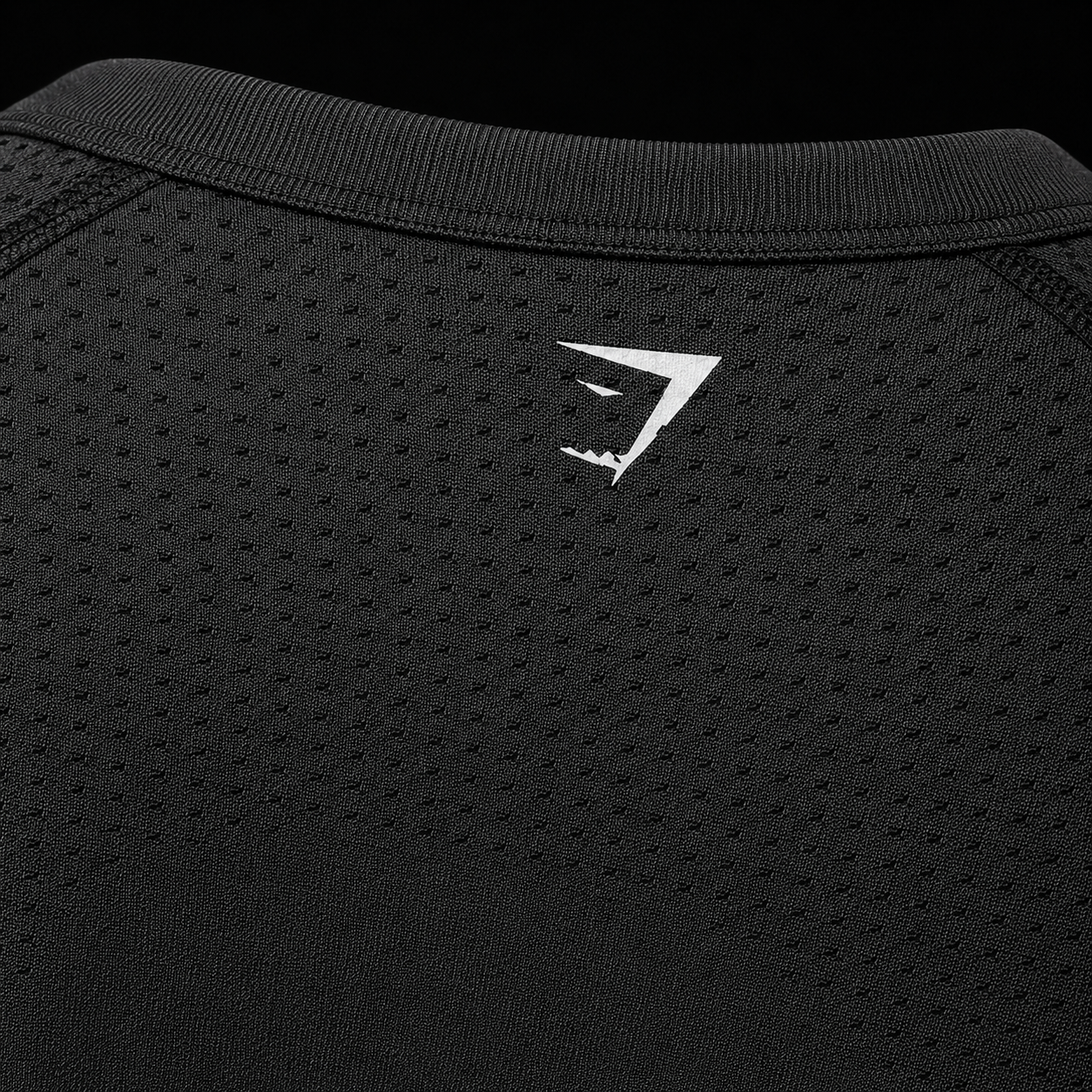 Gymshark Vital Seamless 2.0 Crop Top Black Marl, detalle de cuello y tejido — Crazy!Duck Hype
