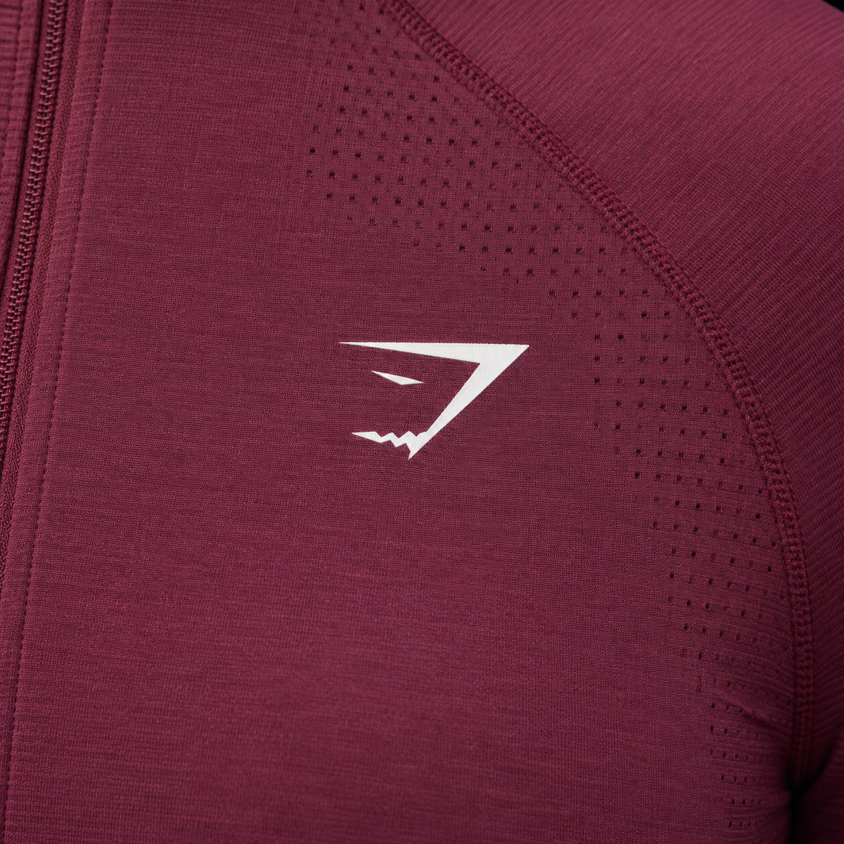 Gymshark Vital Seamless Midi Zip 2.0 Pullover Strength Pink/Marl, detalle de logo y material — Crazy!Duck Hype
