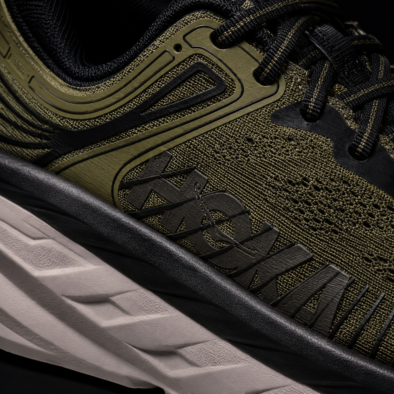 Hoka Bondi 7 Black Brown, detalle de logo y material — Crazy!Duck Hype