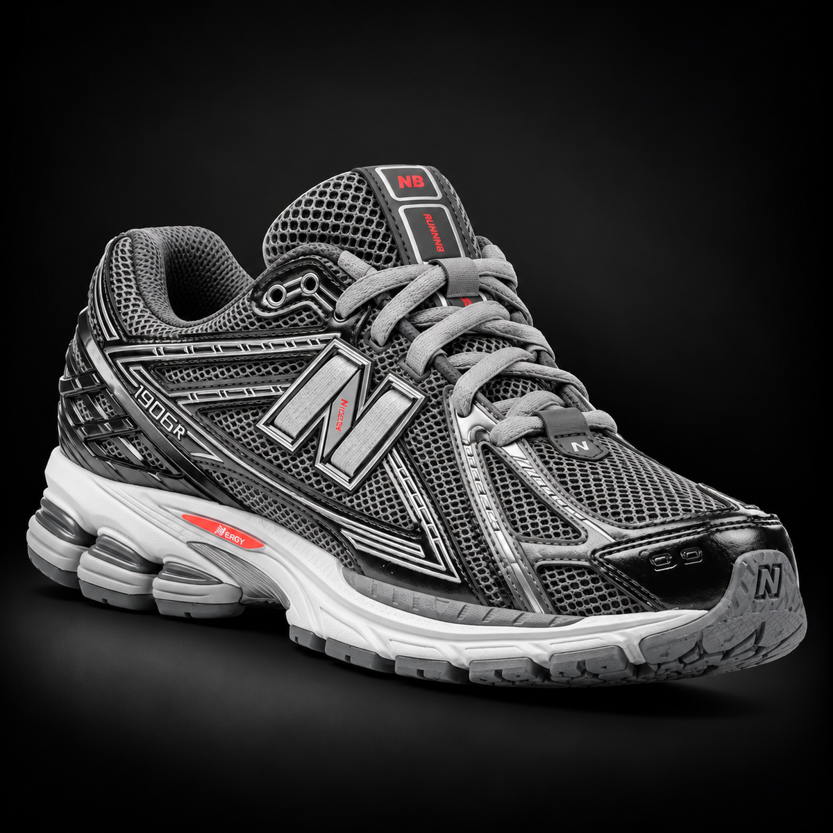 New Balance 1906R Black Metallic Grey Urgent Red, vista frontal — Crazy!Duck Hype